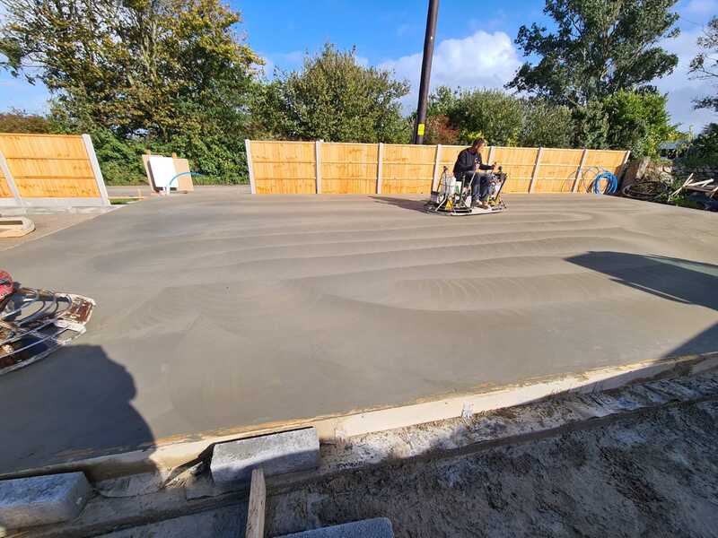 concrete contractors cornwall finishing with power float
